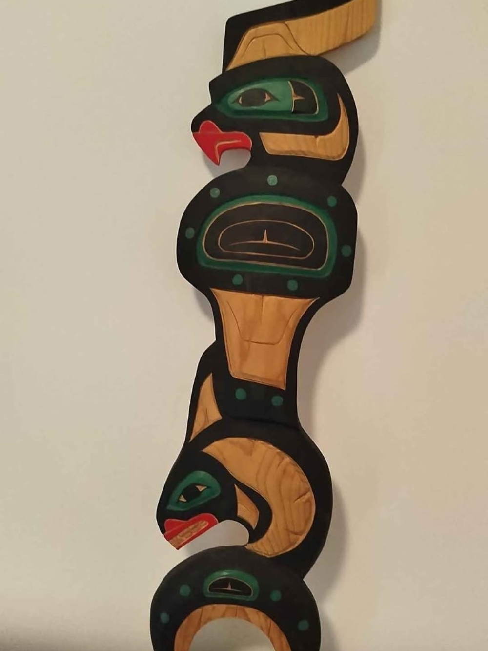 Hand-Carved Indigenous art by Ernie Whitford .
